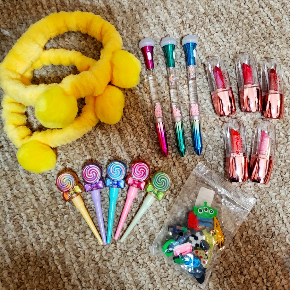 Spa Bands, ph lip glosses, croc charms, lipsticks, light up pens